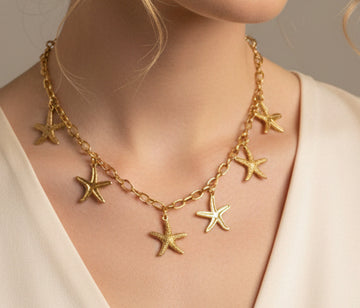 Collar estrellas acero