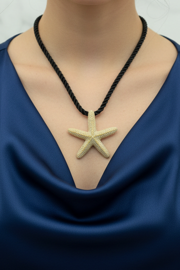 Collar estrella dorado